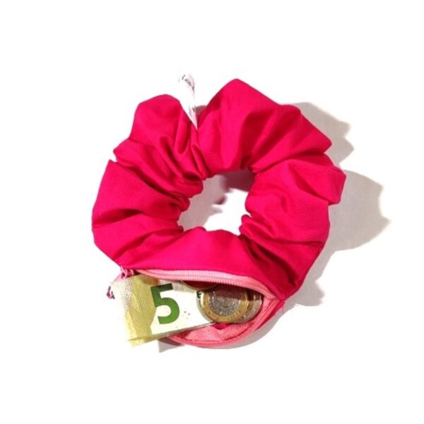 Chouchou zippé rose avec de la monnaie